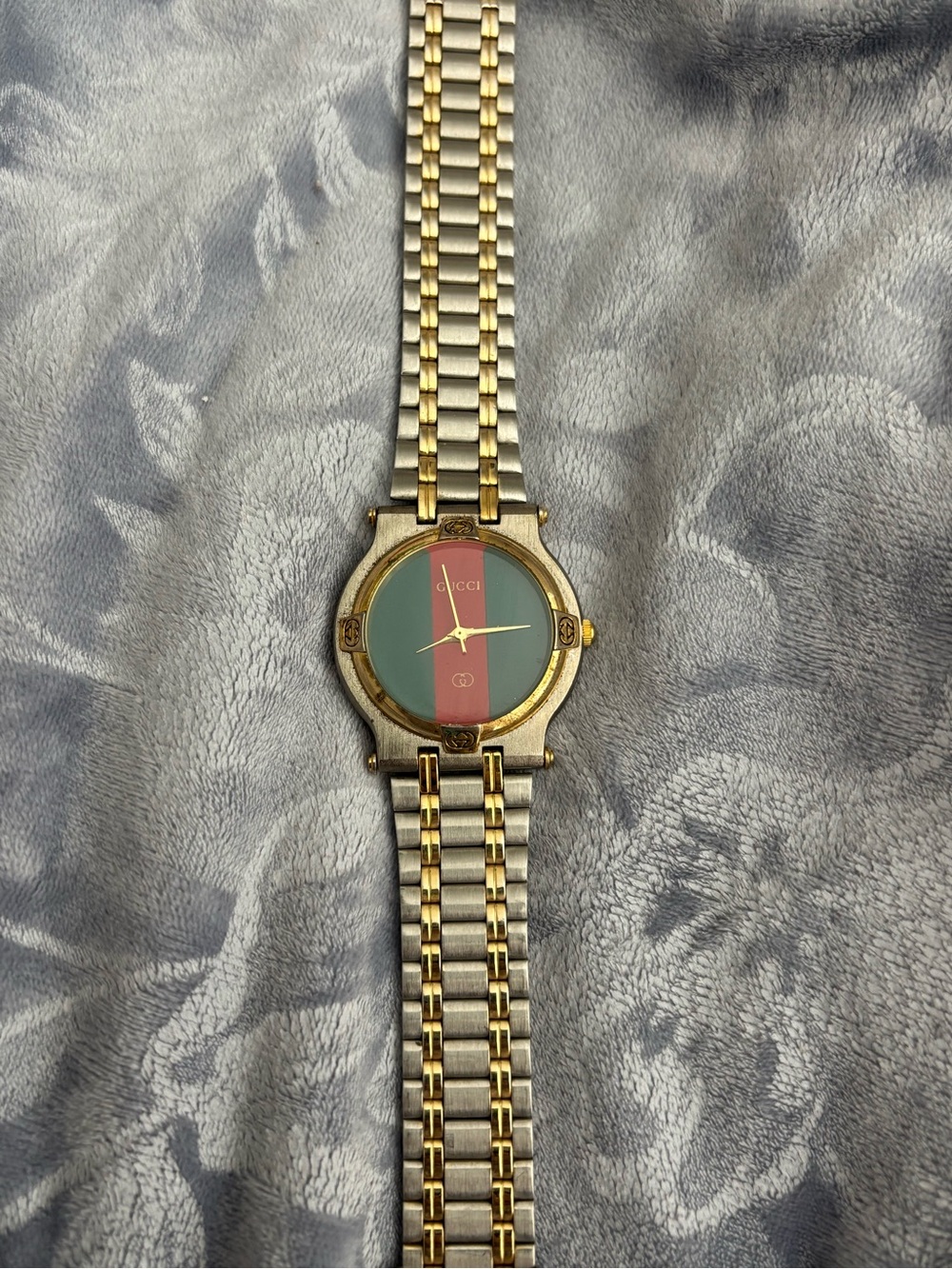 Gucci quartz watch. Two-Tone Gold and Silver Watch with Green-Red Dial